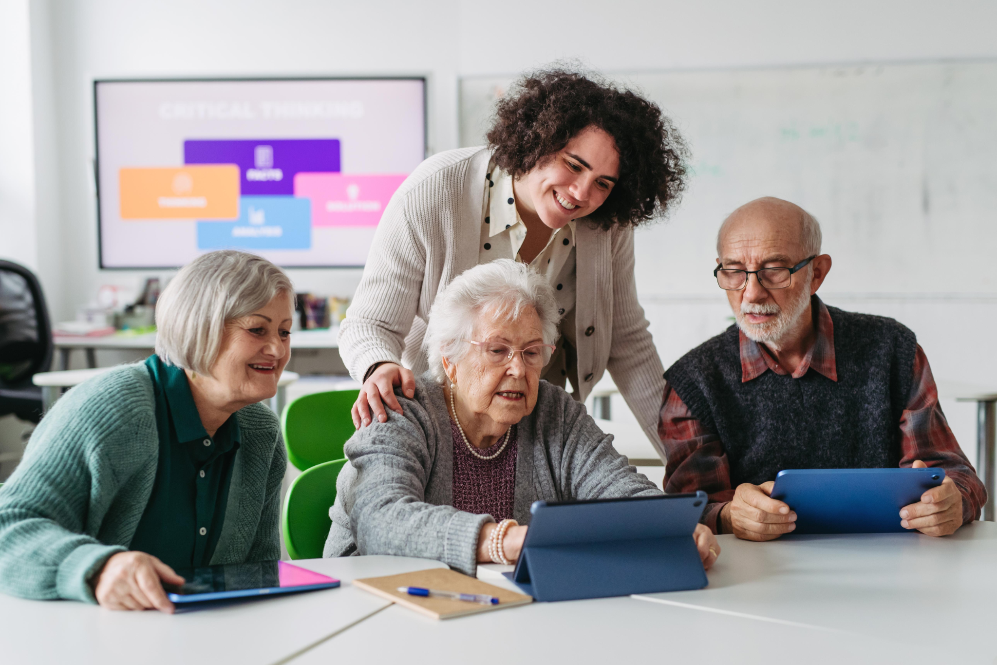 Seniors learning digital safety skills with a community educator β SAF community education program